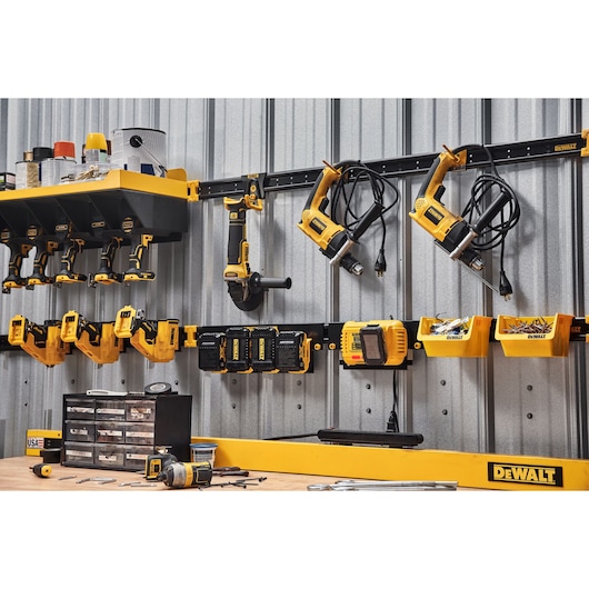 DEWALT Batteries on a Battery Rail and DEWALT Power Tools on a Metal Rail